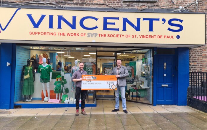 Keith Kelly, StorageWise (left) alongside. Cian Treanor, the shop manager from SVP (right). StorageWise donating €500 to St. Vincent de Paul in Limerick on Thomas Street