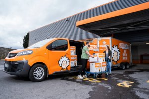 The Complete Guide to Secure File Storage in Ireland 1 two younger people unloading a moving van outside a self storage centre for secure file storage in ireland